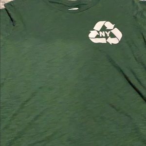 A green t shirt with NY -